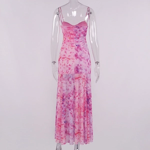 Detail view showing thin straps and vibrant floral print on mesh back of the dress