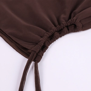 Close-up of dark brown mesh fabric showing detailed ruched texture and drawstring design
