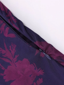 Detail of invisible zipper on purple floral mesh backless dress with fine texture