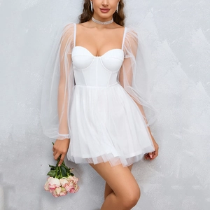 White mesh puff sleeve mini dress with a sweetheart neckline and layered tutu skirt