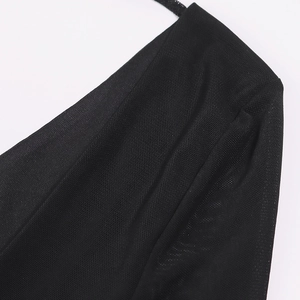 Detailed close-up of premium black mesh fabric texture on the u-neck dress strap