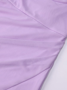 Detail view of lavender mesh fabric with intricate ruched design and clean stitching