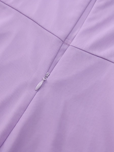 Detail of hidden zipper on light purple mesh dress with fine textured fabric