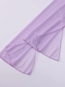 Detail of light purple mesh dress featuring flared cuff and high slit seam stitching