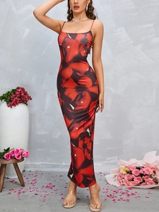 Detail of red floral bodycon midi dress with backless slit design and spaghetti straps