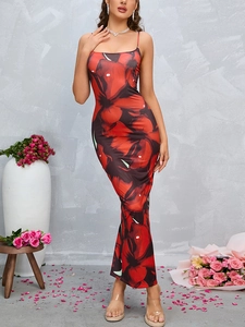 Detail of red floral print on a sexy backless bodycon maxi dress with thin straps