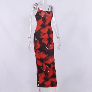 Detail of red floral print maxi dress with slim fit straps and high slit design