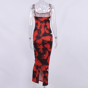Detail of red floral print maxi dress featuring thin straps and back slit design
