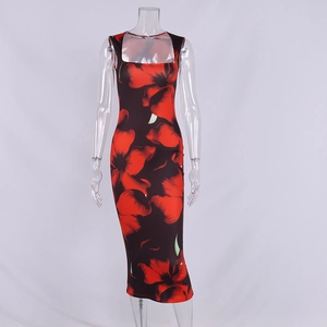 Close-up detail of sexy slim fit floral dress with red flowers on black fabric