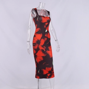 Detail of slim sleeveless maxi dress with bold red floral print on black fabric