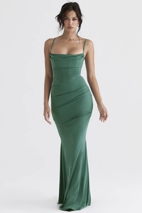 Detailed view of dark green satin evening gown with cowl neck and fishtail silhouette