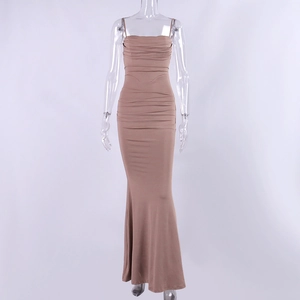 Detail of coffee brown fishtail dress featuring ruching and backless halter design