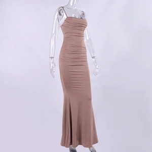 Detail of ruched dust pink maxi dress featuring backless fishtail hem and thin straps