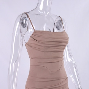 Detail of ruched chest design on a coffee-colored spaghetti strap bodycon dress