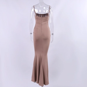 Rear view of sleek camel fishtail maxi dress with invisible zipper and slim straps