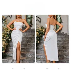 Détail vue avant et arrière de la robe de soirée blanche élégante avec corset et fente haute