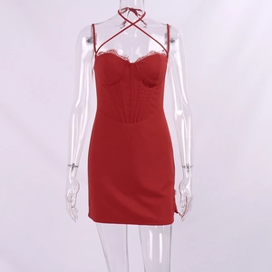 Detail of red bustier mini dress with lace trim and fishbone support corset design