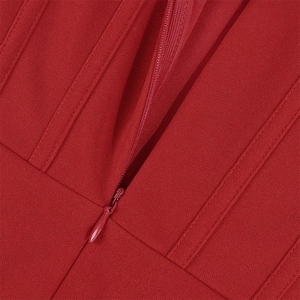 Close-up of red lace dress with seamless hidden zipper and precise decorative stitching