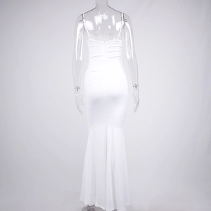 Back view detail of white fishtail dress showing invisible zipper and bodycon silhouette