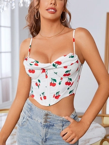 Detail of white floral corset top with red cherry print and fishbone structure design