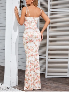 Detailed back view of slim fit floral long dress with spaghetti straps and open back