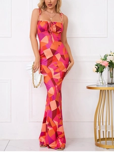 Detail of drawstring ruched chest and geometric floral print on a slim maxi dress