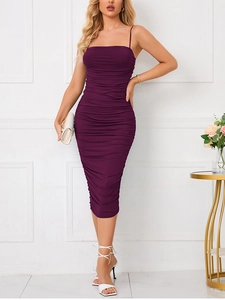 Detail view of the ruched fabric and slim fit design of the purple midi sundress