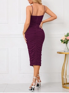 Detail view of the deep purple ruched dress back featuring a hidden zipper and slim straps