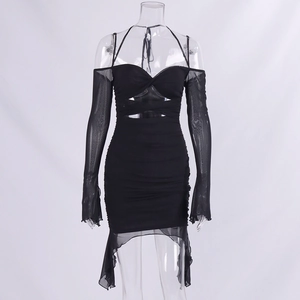 Detail of sexy black mesh bodycon dress with halter neck and side ruching details