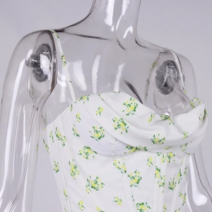 Detailed view of floral corset top featuring delicate boning and pleated bust design