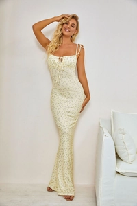 Detail of floral backless long dress with tie shoulder straps and mermaid silhouette