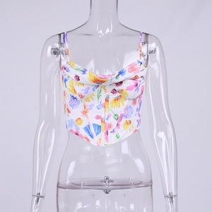 Close-up of floral print corset top with a pointed hem and sunflower pattern detail