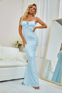 Detail of the light blue floral maxi dress showing delicate straps and pleated neckline