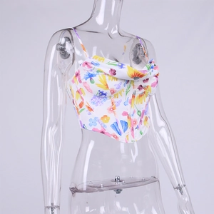 Detailed view of floral corset top with ruched cowl neck and structured boning seams