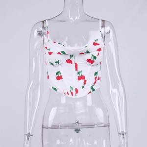 Detailed view of corset top featuring cherry print and structured boning seams