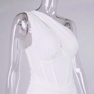 Detail of white one-shoulder mesh dress featuring corset boning and pleated fabric