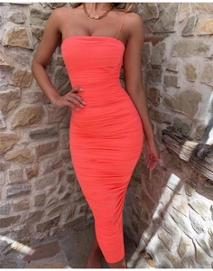 Detail of neon orange ruched midi dress with thin straps and slimming bodycon fit