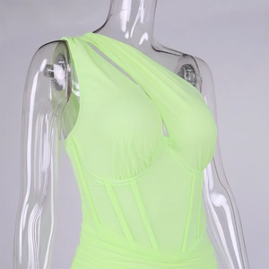 Detail of neon green one-shoulder mini dress with cutout and corset boning structure