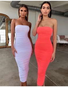 Ruched summer midi dress details showing thin straps and vibrant orange and white fabric