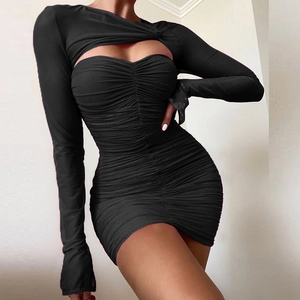 Sexy black ruched long sleeve mini dress featuring chest cutout and mesh bodycon fit