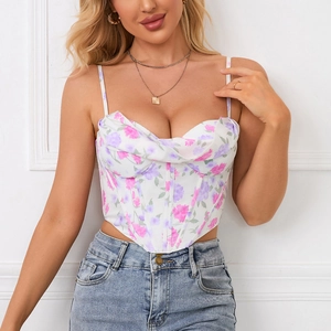 Floral print corset camisole with spaghetti straps and a pointed hemline on a model