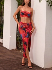 Detail of ruched high slit skirt and crop top in abstract watercolor ink print