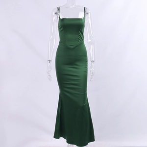 Detailed view of dark green satin dress featuring corset style bodice and fishtail hemline