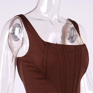Detailed front view of brown corset top with square neckline and boning structure