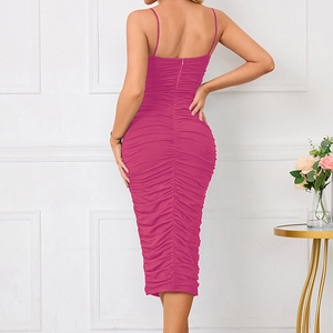 Detail view of the back zipper and ruched texture on this elegant rose red midi dress