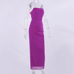 Detail view of purple ruched mesh evening dress showing side pleats and slim fit