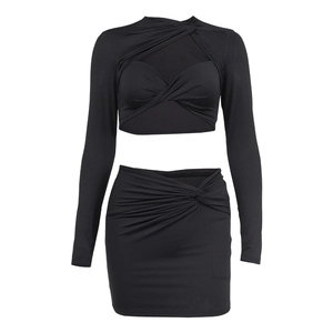 Women's two-piece black set featuring a hollow-out long sleeve top and mini skirt