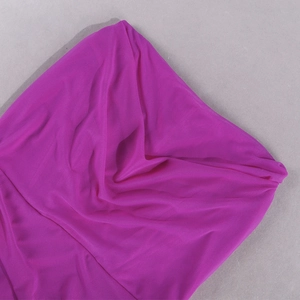 Detail shot of pleated magenta mesh fabric with soft textures for an off-shoulder dress