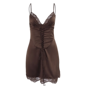Brown satin mini dress with deep V-neck, lace trim, and vintage lace-up detail