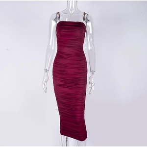 Detail view of burgundy ruched bodycon midi dress featuring sleek satin texture fabric